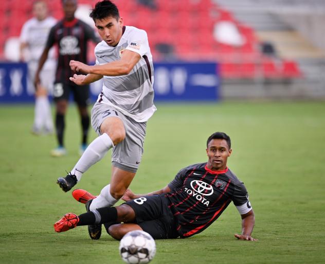 Sacramento Republic FC fights through a tackle by San Antonio FC