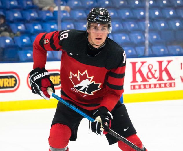 Kelowna Rockets forward Nolan Foote with Team Canada