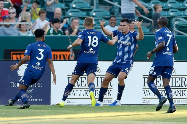 Fresno FC defender Ramon Martin Del Campo (4) celebrates with teammates