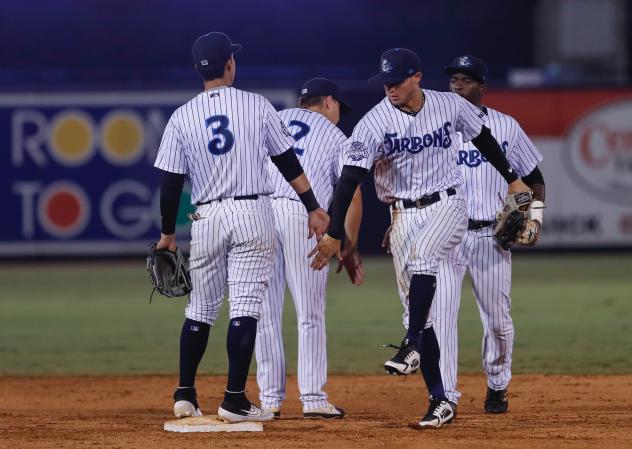 Oswaldo Cabrera (3) and Pablo Olivares of the Tampa Tarpons