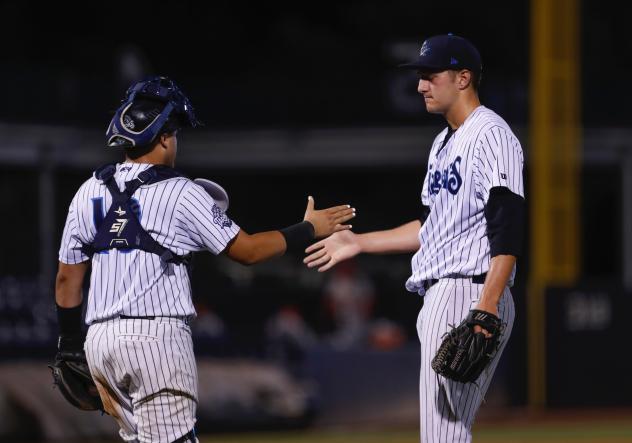 Catcher Jason Lopez and pitcher Daniel Bies of the Tampa Tarpons