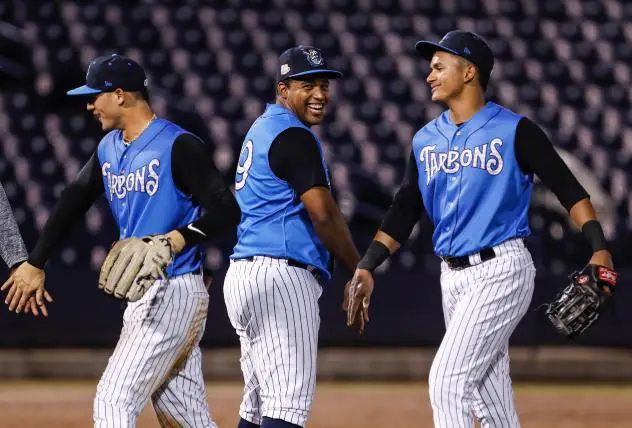 Pablo Olivares, Alexander Palma and Leonardo Molina of the Tampa Tarpons