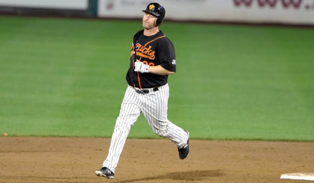 Lew Ford of the Long Island Ducks rounds the bases