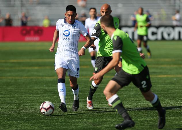 FC Edmonton with possession against York 9 FC