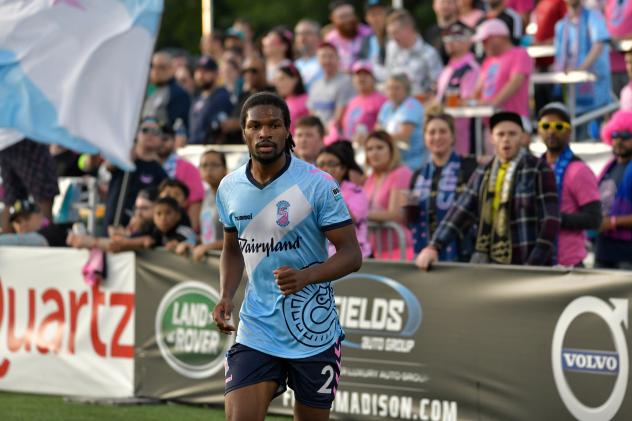 Forward Madison FC defender Carter Manley
