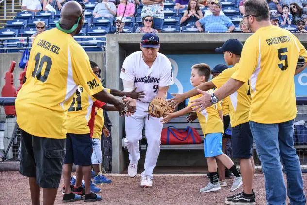 Taylor Grzelakowski enters the field for the Pensacola Blue Wahoos