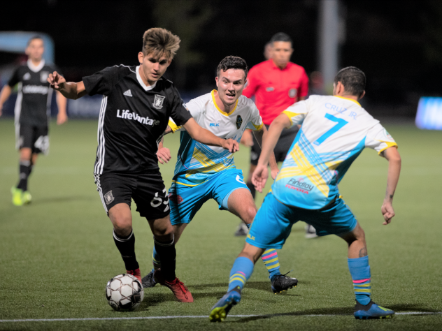 Las Vegas midfielder Mobi Fehr (middle)