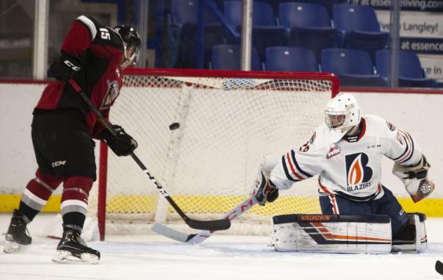 Vancouver Giants left wing Owen Hardy shoots against the Kamloops Blazers