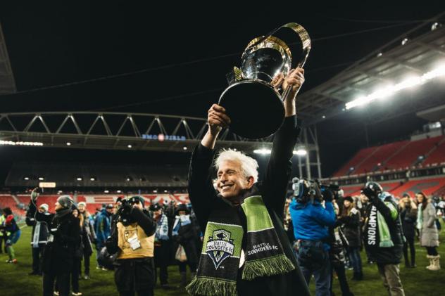 Seattle Sounders FC founding owner Joe Roth raises the MLS Cup following Seattle's victory over Toronto FC in 2016