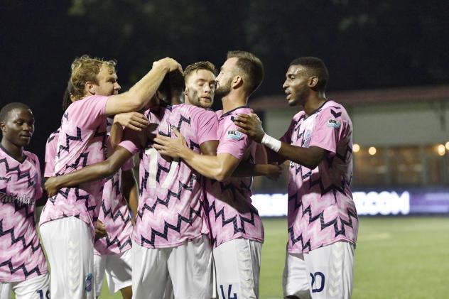 Forward Madison FC celebrates a goal against the Milwaukee Torrent