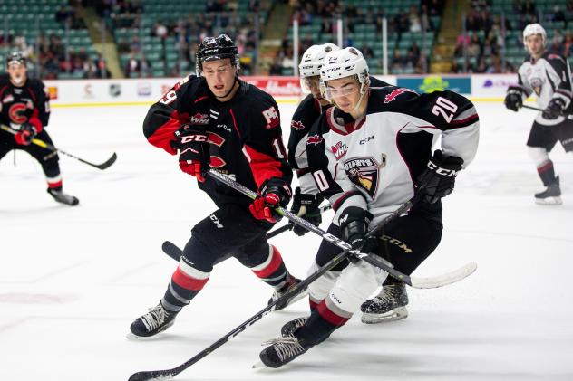 Vancouver Giants right wing Lukas Svejkovsky (right) against the Prince George Cougars