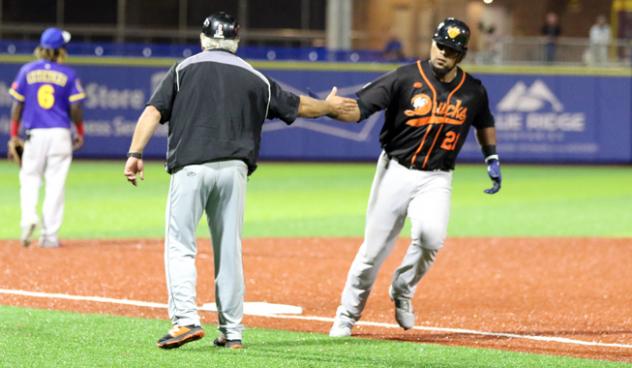 Deibinson Romero of the Long Island Ducks rounds the bases