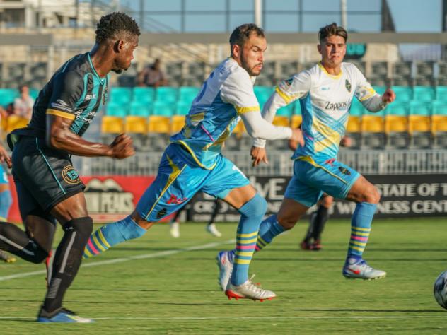 Las Vegas Lights FC captain Bryan De La Fuente (center)