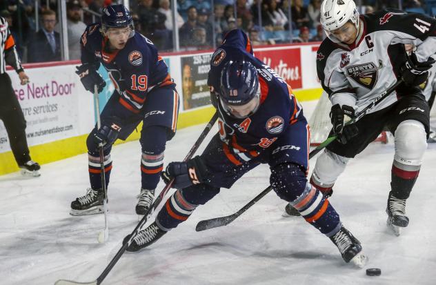 Vancouver Giants defenceman Alex Kannok Leipert (right) vs. the Kamloops Blazers