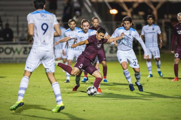 Sacramento Republic FC defender Matt Mahoney surrounded by El Paso Locomotive FC