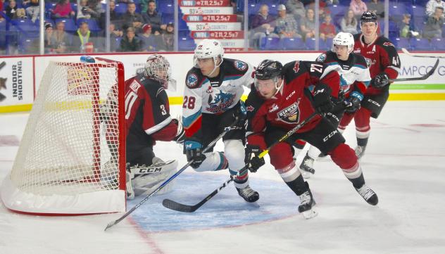 Vancouver Giants defenceman Seth Bafaro battles the Kelowna Rockets