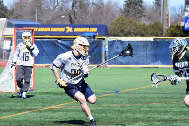 Defenseman Logan Monroe with Canisius College