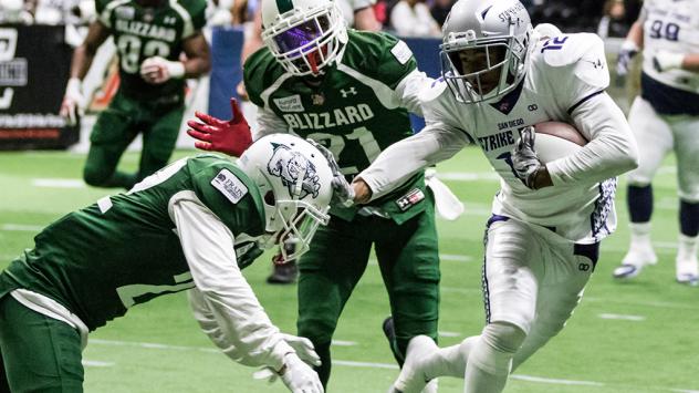 Marques Rodgers of the San Diego Strike Force (right) against the Green Bay Blizzard