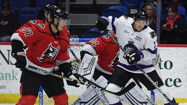 Adirondack Thunder defenseman Gabriel Verpaelst (left) vs. the Reading Royals
