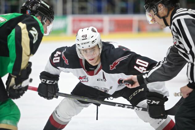 Vancouver Giants centre Milos Roman faces off with the Prince Albert Raiders