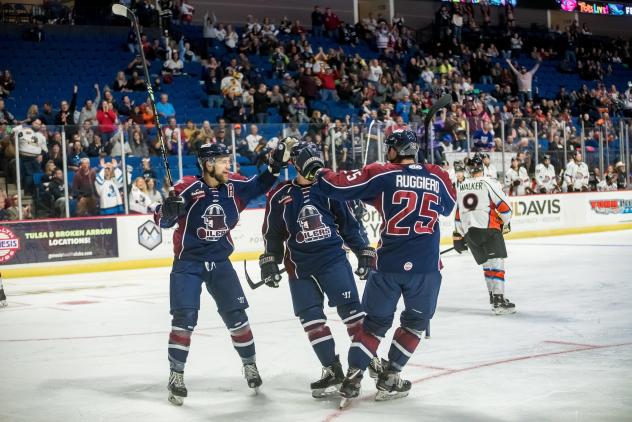 Tulsa Oilers celebrate a goal on opening night