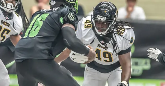 Linebacker Fred Williams (right) with the Carolina Energy