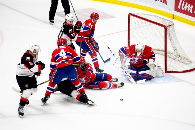 Spokane Chiefs goaltender Campbell Arnold and defense vs. the Prince George Cougars