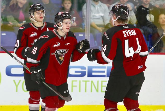 Vancouver Giants centre Cole Shepard (16) and defenceman Bowen Byram