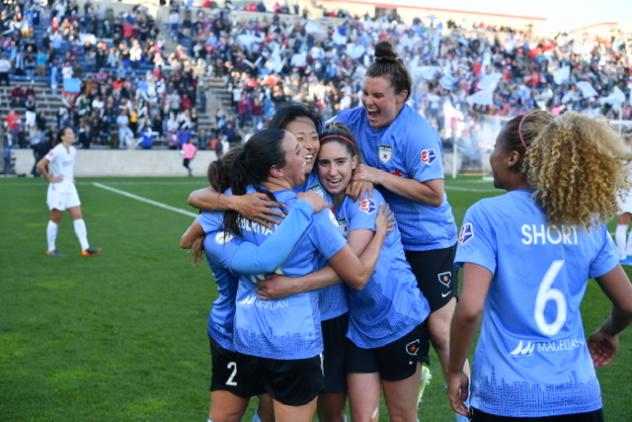 Chicago Red Stars celebrate their playoff victory