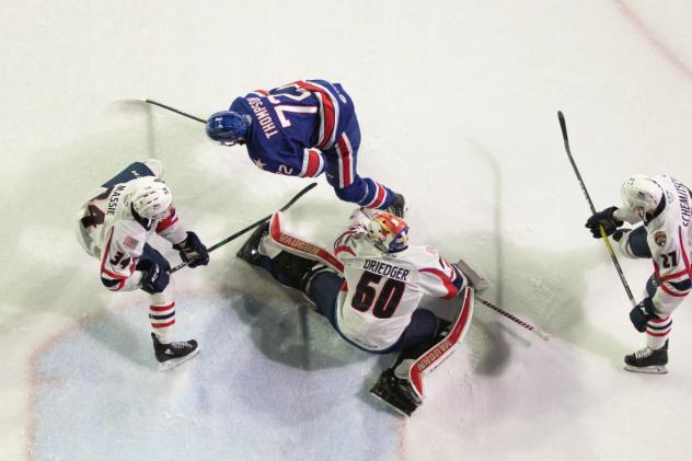 Springfield Thunderbirds goaltender Chris Driedger holds off the Rochester Americans