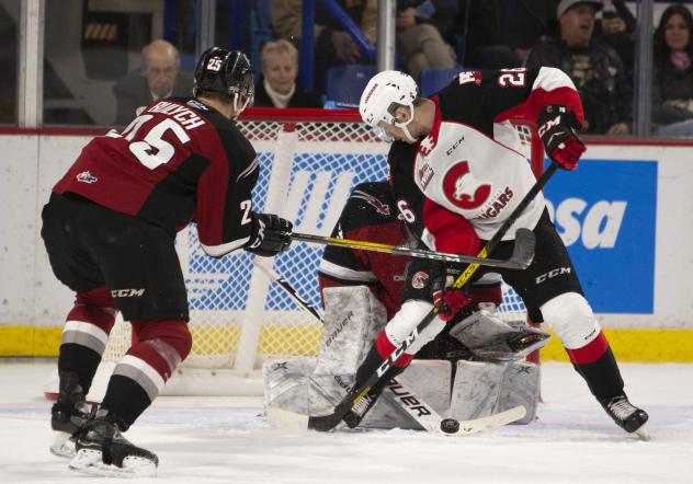 Vancouver Giants defenceman Kaleb Bulych defends against the Prince George Cougars