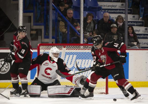 Vancouver Giants defenceman Alex Kannok Leipert (right) vs. the Prince George Cougars
