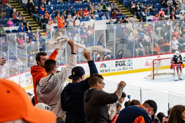 Flint Firebirds fans cheer on the team