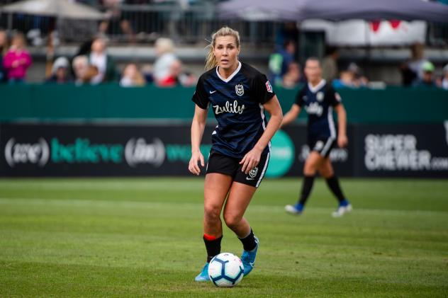 Reign FC midfielder Allie Long