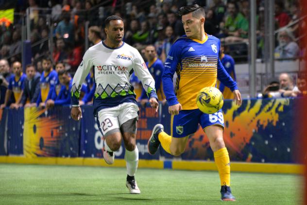 Tacoma Stars midfielder Raphael Cox (left) defends against Luis Ortega of the San Diego Sockers