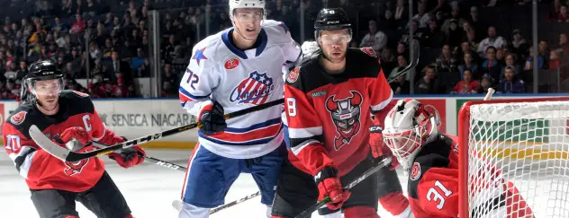 Binghamton Devils defend against the Rochester Americans