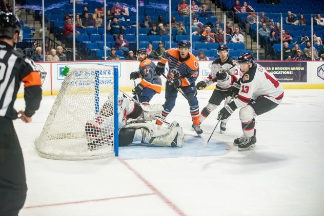 Tulsa Oilers take a shot against the Rapid City Rush