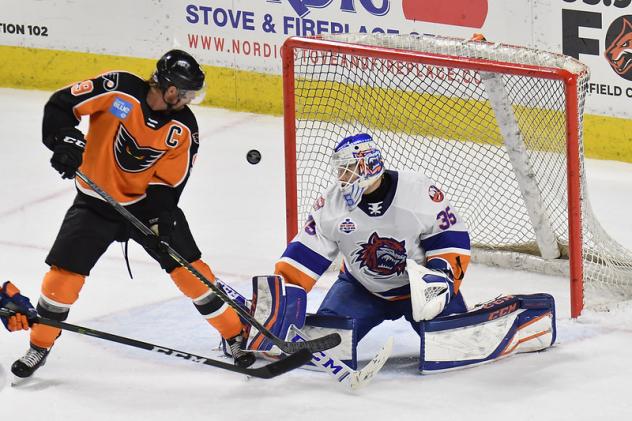 Lehigh Valley Phantoms center Cal O'Reilly shoots against the Bridgeport Sound Tigers