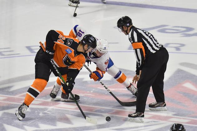 Lehigh Valley Phantoms forward Mikhail Vorobyev faces off against the Bridgeport Sound Tigers