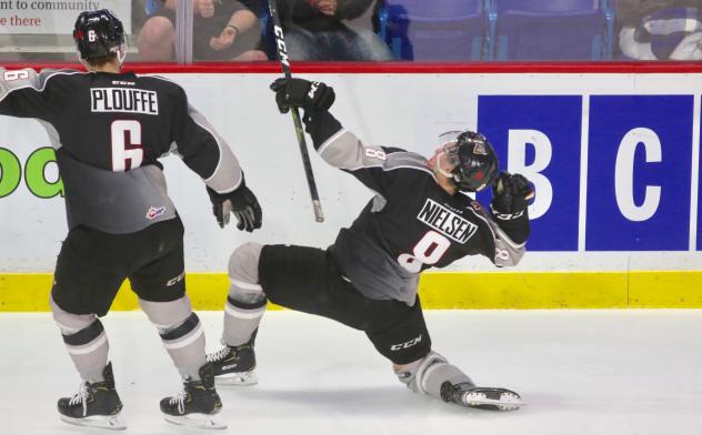 Vancouver Giants centre Tristen Nielsen celebrates a goal with defenceman Dylan Plouffe