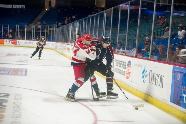 The Tulsa Oilers battle the Allen Americans up against the boards