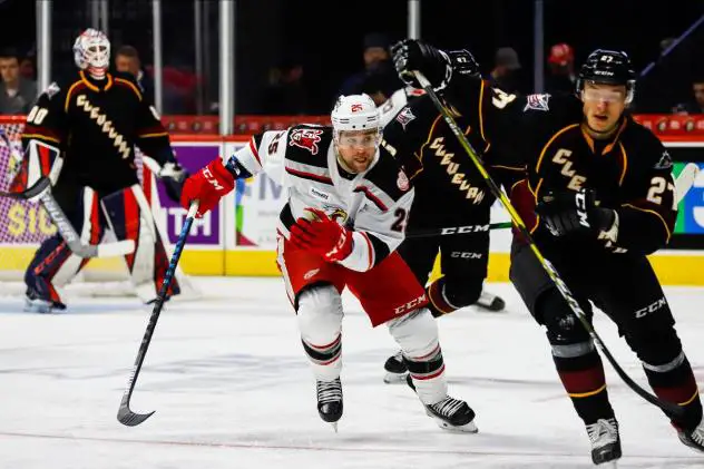 Grand Rapids Griffins right wing Chris Terry (center) against the Cleveland Monsters