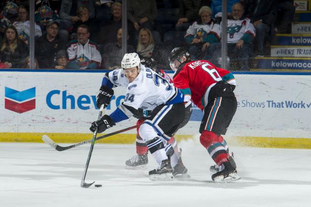 Kelowna Rockets defenceman Kaedan Korczak (right) battles the Victoria Royals