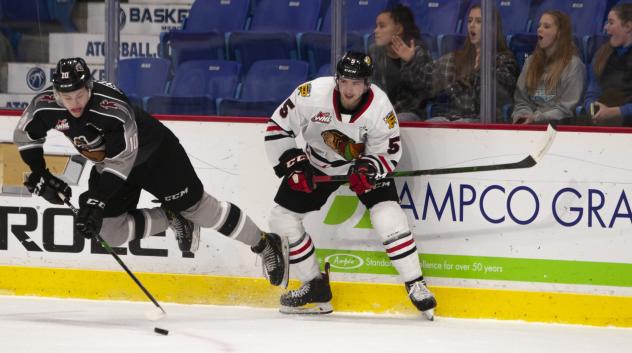 Vancouver Giants left wing Zach Ostapchuk (left) vs. the Portland Winterhawks