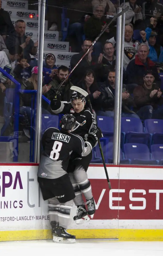 Tanner Brown and Tristen Nielsen after a Brown's goal against the Vancouver Giants