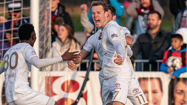 Louisville City FC midfielder Magnus Rasmussen celebrates his game-winning goal against Indy Eleven