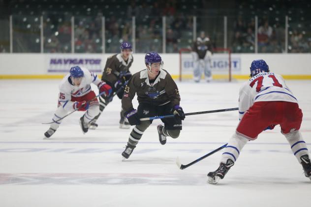 Tri-City Storm defenseman Kyle Aucoin vs. the Des Moines Buccaneers