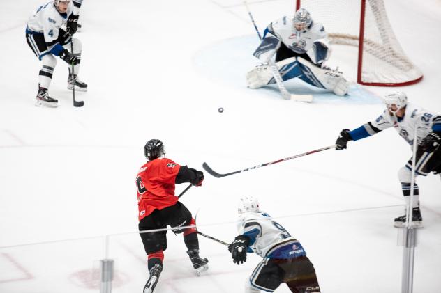 Prince George Cougars take a shot against the Victoria Royals
