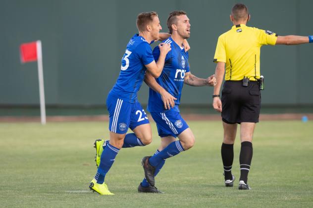 Reno 1868 FC midfielder Sam Gleadle congratulates Corey Hertzog