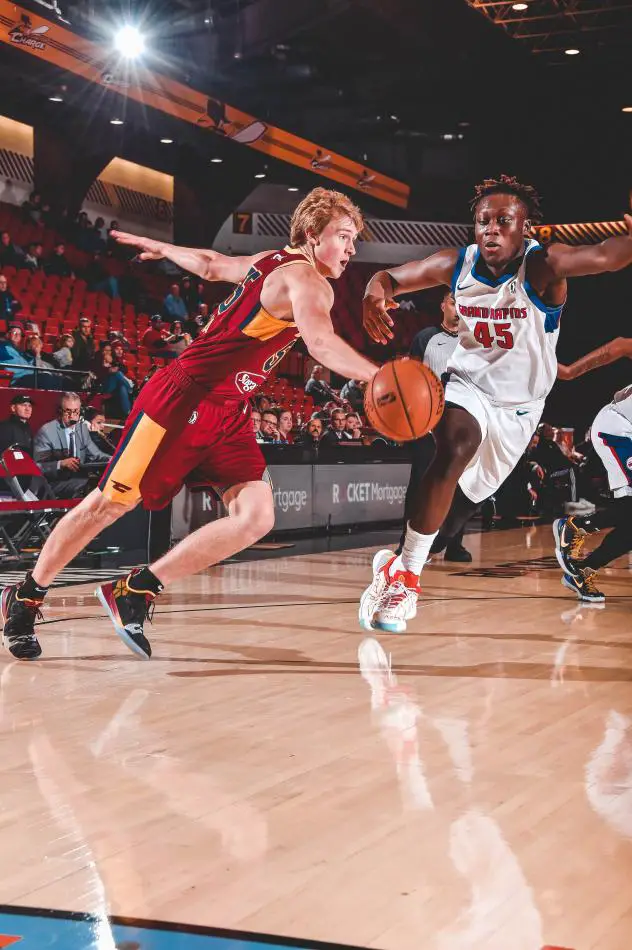 J.P. Macura of the Canton Charge (right) vies for the ball vs. Sekou Doumbouya of the Grand Rapids Drive